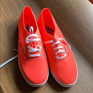Women’s size 8, neon orange low profile vans
